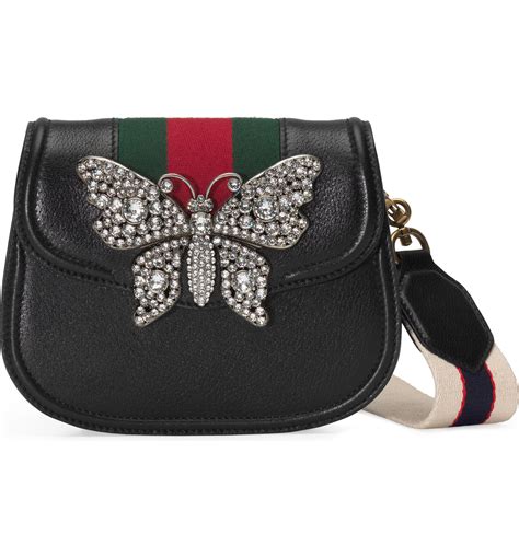 gucci butterfly purse.